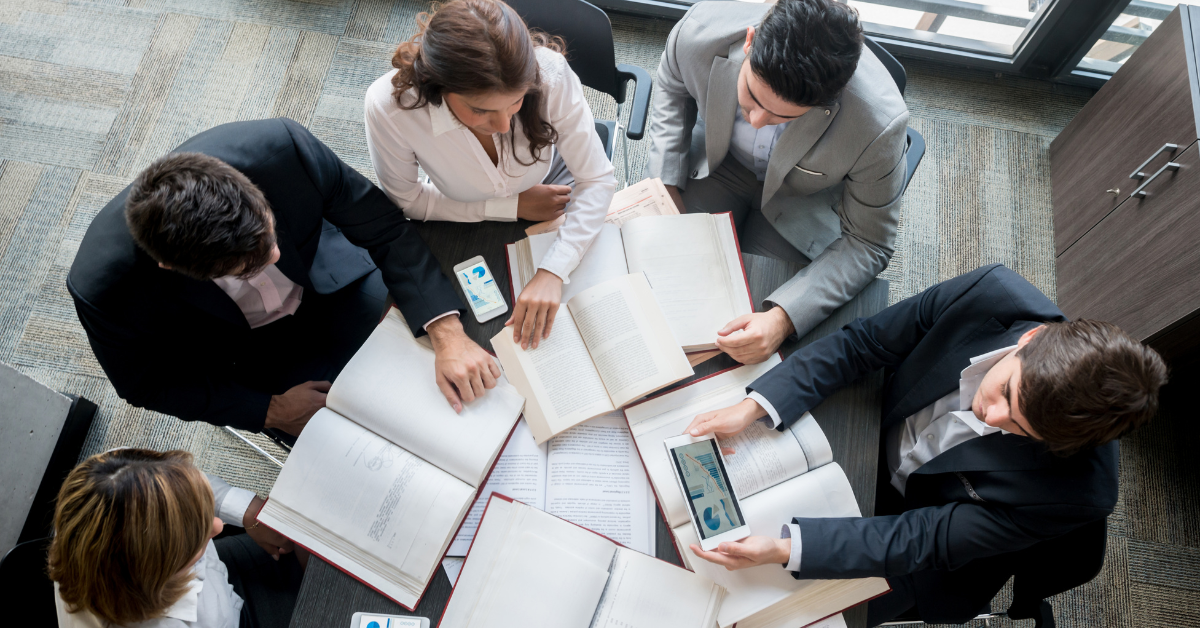 Business people gathered around a table